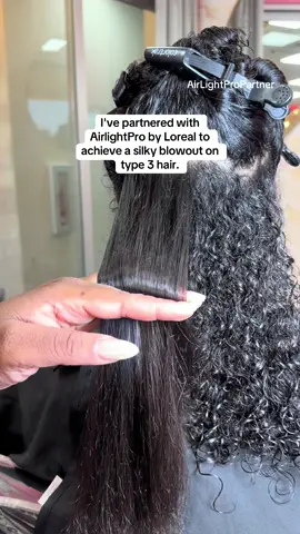 As someone who prioritizes the health of my clients' curls, the #AirLightPro is a game-changer! 🌬️ This lightweight dryer cuts drying time while using infrared light to help protect and preserve your natural texture. It’s truly a must have for anyone who wants to receive long quality blowouts without the damage. 🤍 @L’Oréal Professionnel @SalonCentric #AirlightProPartner