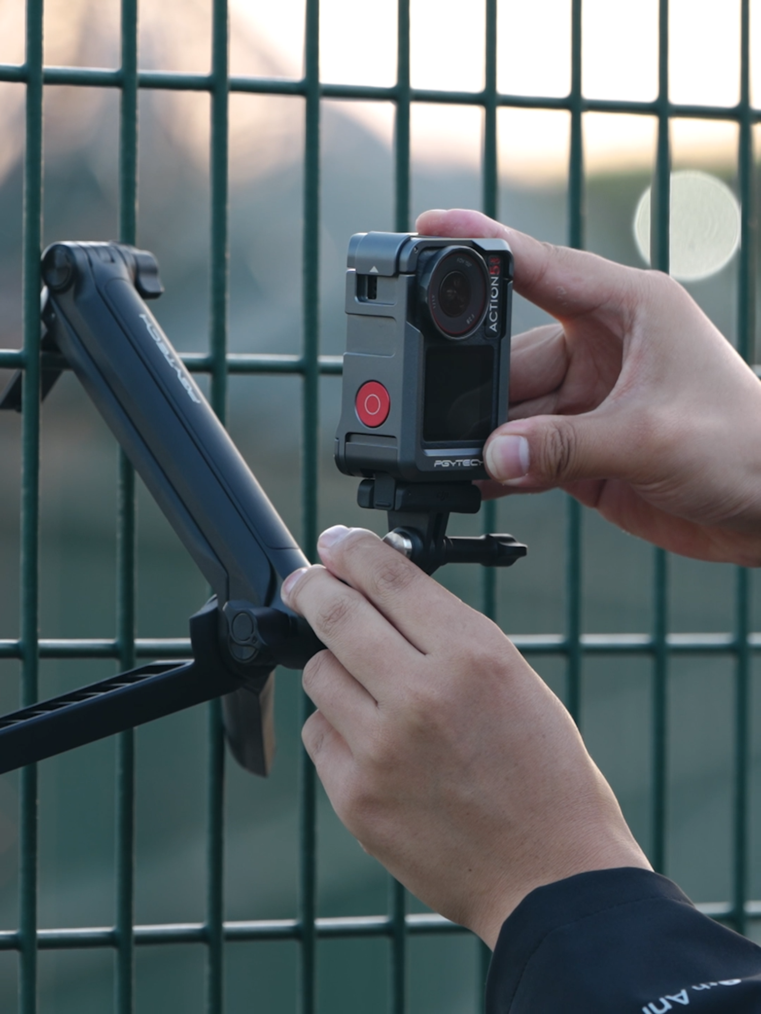 🎥 Designed exclusively for the DJI Osmo Action 5 Pro, our camera cage is your ultimate sidekick for dynamic shots!  💪 Expand your creative horizons and capture like a pro. 🌟📸 #pgytech #caplock #quickrelease #actioncamera #dji #djiaction5pro #cameragear #shootsmarter