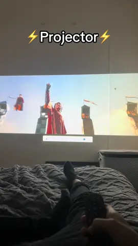 Perfect projector for at home film nights. Stay comfortable in bed whilst watching your favourite films and shows. No downloading required just connect to the wifi and your ready to go. Click the link to get yours now #film #movienight #homecinema #cosy #winter #fyp #foryou 