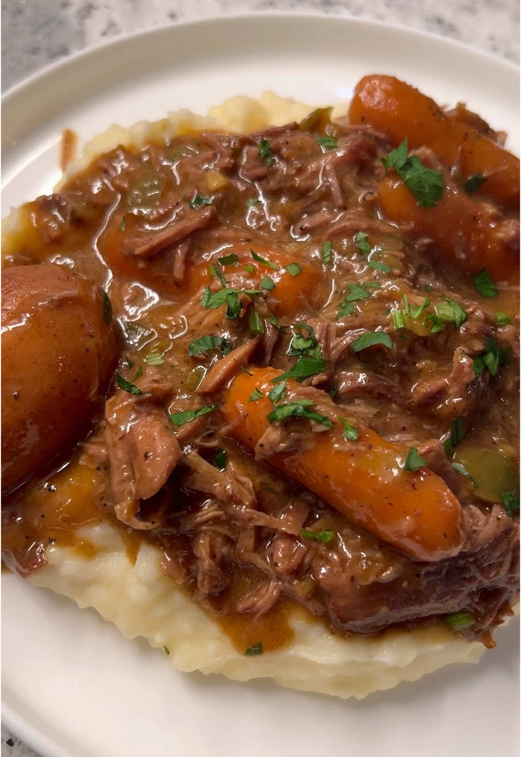 Nothing beats a tender, juicy pot roast! Thanks to @Good Ranchers for 100% American beef—use code BRITSCOOKIN for 10% off your first box, plus free shipping!! 🇺🇸 Roast Recipe Ingredients: • 2 lb beef roast (chuck or shoulder) • 2-3 tbsp olive oil • 1 tsp garlic salt (adjust to taste) • 1 tsp black pepper (adjust to taste) • 2 tsp Cajun seasoning (adjust to taste) • 1 onion, chopped • 1 bell pepper, chopped • 3-4 garlic cloves, minced • 1/4 cup all-purpose flour • 32 oz unsalted beef broth • A few dashes Worcestershire sauce • A few dashes hot sauce (optional, adjust to taste) • 8-10 baby carrots • 8-10 baby potatoes, halved Instructions: 1. Preheat oven to 350°F 2. Rub the beef roast with garlic salt, black pepper, and Cajun seasoning. 3. Heat olive oil in a large Dutch oven or oven-safe pot over medium-high heat. 4. Brown the roast on both sides in the pot, then remove and set aside. 5. In the same pot, sauté the onion, bell pepper, and minced garlic until softened. 6. Sprinkle in the flour and stir until combined, cooking for about 1-2 minutes. 7. Gradually whisk in the beef broth, followed by Worcestershire sauce, hot sauce, and additional Cajun seasoning to taste. 8. Add the browned roast back into the pot, along with baby carrots and potatoes. 9. Cover the Dutch oven and bake for 3 hours or until the roast is tender. (Stir at the half way mark!) 10. Adjust the gravy consistency with additional liquid, if needed. Add more seasoning if necessary. 11. Serve the pot roast over mashed potatoes or rice! So good y’all! #AmericanMeatDelivered #PotRoast #Yum #ComfortFood #EasyRecipes