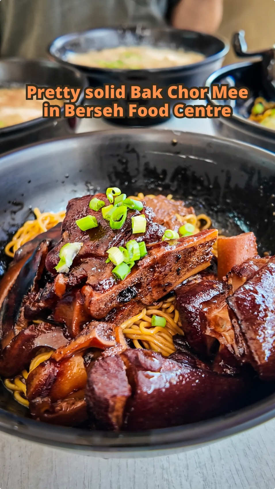 When I heard that the 徒弟 of the 徒弟 of MacPherson Minced Meat Noodles had opened a stall at Berseh Food Centre, I knew I had to check it out. The stall is run by 26-year-old Owen, who trained under Ah Yong, the 徒弟 of the original MacPherson Minced Meat Noodles from Tai Thong Crescent. With Ah Yong’s blessing, Owen decided to strike out on his own, and I wanted to see how he’s carrying on the legacy. Owen’s dedication is nothing short of inspiring. He wakes up at 3 AM every morning to prep fresh ingredients, reaches the stall by 4 AM, and has everything ready to go by 6:30 AM. Running the stall entirely on his own—taking orders, cooking the noodles, and preparing the soup—takes serious multitasking skills. The best part? There’s no queue yet, so each bowl is cooked with care. This was actually my second visit to Owen’s stall. The first time, a few weeks ago, I felt like he wasn’t quite ready yet. The workflow was a little rough, and the flavors in the noodles needed refining. I decided to wait before sharing about it—because everyone deserves a chance to grow. I’m glad I came back, though, because this time round, Owen’s noodles and soup have improved. The noodles are now cooked perfectly al dente and tossed in a delicious blend of vinegar, lard, and his secret braising sauce. That mix gives it a beautiful umami punch that keeps you going back for more. And the soup—oh, the soup! It’s rich, slightly sweet, and comforting, the kind that makes you savour every spoonful.  I’d say Owen is about 70% of the way to reaching his mentor Ah Yong’s level of kungfu, but that’s already good enough for me to want to return. I think with more confidence, and maybe some help when the crowds start coming in, Owen will continue to thrive. If you’re in the area, make it a point to visit Berseh Food Centre and support Owen. His noodles are already delicious, and I have a feeling they’ll only get better with time. Young hawkers like him deserve our encouragement—and an empty stomach! #sgfood #sgfoodie #fyp #foryoupage 