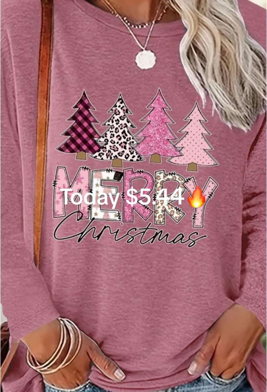 🎄Hey, family! Christmas is coming soon. Today, I must share with you a dropped-shoulder top that's perfect for this occasion! This top is full of Christmas elements. It has cute Santa Claus🎅, reindeer pulling sleds🛷, and colorful Christmas trees🎄 printed on it. Just looking at it makes you feel like you're in a dreamy Christmas world. The dropped-shoulder design of it is even more ingenious. It naturally brings a casual and lazy feeling, making the whole look have the cheerful atmosphere of the festival while still maintaining the comfort of daily wear. The fabric is soft and smooth, and it feels as comfortable as being bathed in warm sunlight when you wear it. Whether paired with a simple black leggings to highlight a casual look or matched with a red pleated skirt to add more festive colors, it can handle them all perfectly. During this Christmas, if you put it on and go out, I guarantee that you'll become the most Christmassy sight on the street! 🤶💕 #Dropped-ShoulderTop #ChristmasPattern #christmasoutfit  #creative #TikTokMadeMeBuyit #spotlightfinds #fyp #falldealsforyou #Blackfridaysale #tiktokmademebuyit #tiktokshopcybermonday #tiktokshopblackfriday #sweater #spotlightfinds #fypage #dealsfordays #spotlight #halaratiktokshop #tiktokshopbacktoschool 