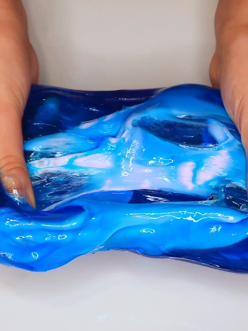 Here is a look at one of the first slimes we ever made! We have them back in stock right now! Visit us at poppymello.com to see all of our available slimes! #poppymello #slime #slimes #asmr #asmrvideo #asmrslime #slimeasmr #satisfying #satisfyingslime #satisfyingvideo #satisfyingasmr #relaxing #relaxingslime #relaxingasmr #relaxingvideo #axolotls #blue #slimevideo #fyp #foryoupage 