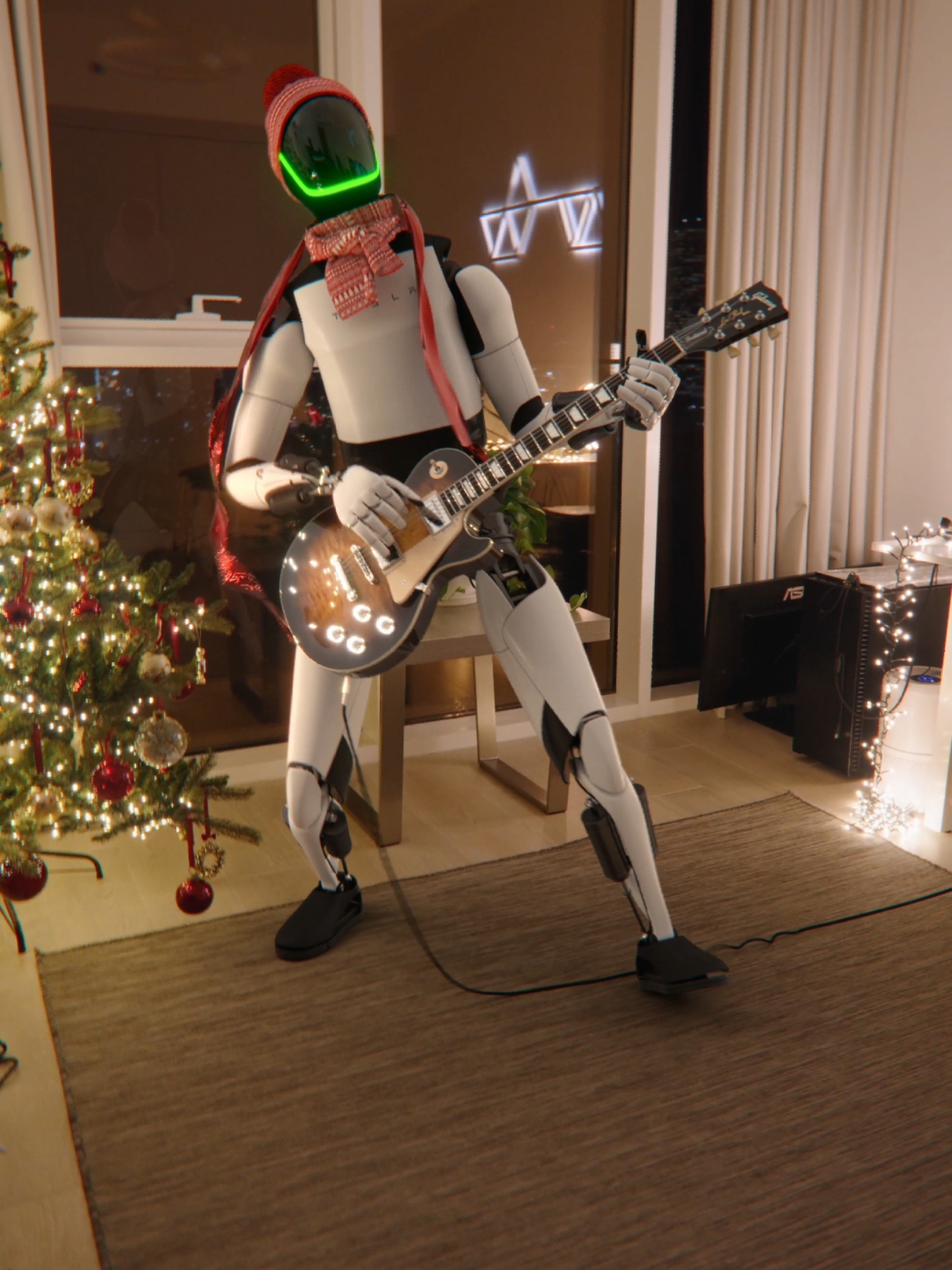 First, he decorated the tree. Now he’s jamming out Last Christmas like a rockstar! 🎄🤖🎸 Thanks, Tesla, for turning my house into a rock arena 😂 . #teslarobot #optimus #tesla #robot #irobot #christmas2024