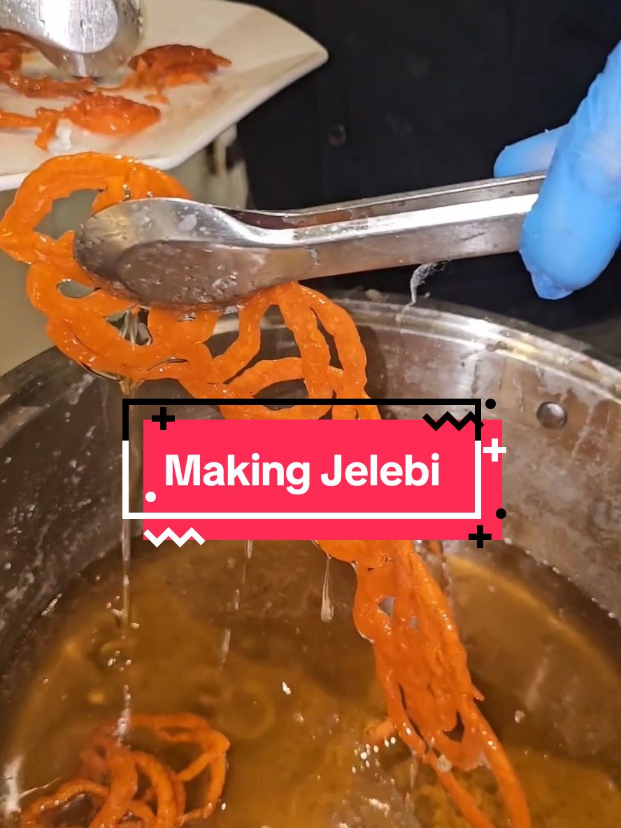 Jalebi is a spiral-shaped sweet with crispy layers soaked in sugar syrup, popular in South Asia, the Middle East, and parts of Africa. It has a tangy-sweet flavor and is often served during festivals and celebrations. History and Origin Jalebi originated in the Middle East, where it was known as zalabiya. It was introduced to the Indian subcontinent by Persian traders or invaders. Over time, it evolved into the jalebi we know today, becoming a beloved part of South Asian cuisine. How to Make Jalebi Batter: Mix flour, yogurt, and a leavening agent, and ferment for a few hours. Sugar Syrup: Prepare with sugar, water, and optional cardamom or saffron. Fry: Pipe spirals into hot oil and fry until golden. Soak: Dip in warm syrup, coat well, and serve warm. It’s a treat that combines centuries of history with modern-day indulgence! #jelebi #dessert #indianfood #sweet 