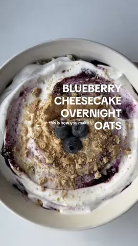 RECIPE BELOW 🫐👩🏽‍🍳❤️ Oats (2 servings) - 1 cup oats (quick oats or old fashioned oats, doesn’t matter)  - 1 tbsp chia seeds - 1.5 scoops of vanilla protein powder (50g) - 1 cup unsweetened almond milk - 1 tbsp sweetener of choice (I used sugar-free maple syrup, you can also use normal maple syrup or honey!)  - 1 tsp vanilla extract - handful fresh (or frozen since they’re cheaper!) blueberries Toppings (1 serving)  - 1/2 cup frozen blueberries (microwaved)  - 3/4 cup 0% Greek yogurt  (made an oopsies in the vid)  - 1 tbsp light cream cheese - 1tsp sweetener of choice (I used sugar-free maple syrup) - 1 graham cracker wafer  - 3 cute little fresh blueberries to decorate 🫐🥰 Mix all your oatmeal ingredients together then store in the fridge for 4-8hrs/overnight.  Once ready to assemble, microwave 1/2 a cup of frozen blueberries for 30-45 sec - depending on how strong your microwave is. Then mix your Greek yogurt, light cream cheese, & sweetener of choice in a separate small bowl.  Add your overnight oats in a bowl, then your blueberry purée & yogurt mixture. Crumble 1 a graham cracker on top & a couple more blueberries to garnish then enjoy!  Nutritional Facts (like 95% accurate) ***using 0% Greek yogurt & sugar free maple syrup*** - 505 cals  - 46g protein - 52.5g carbs  - 8g fiber  - 11.5g fats  #fyp #oats #oatmeal #overnightoats #fiber #fiberfoods #highfiberandprotein #healthybreakfast #highprotein #highproteinbreakfast #healthybreakfastideas #overnightoatsrecipe #blueberrycheesecake #cheescakeovernightoats #blueberryobernightoats #blueberryoatmeal #blueberrycheesecake 