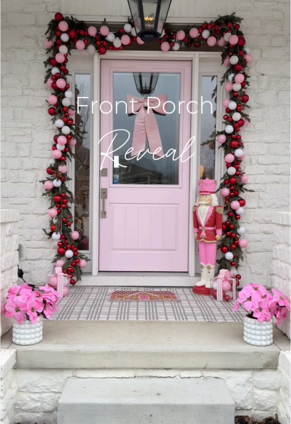 This might be my favorite Christmas porch ever!!🎄🩷❤️ The pink and red combo is perfect.🤌🏻 I debated painting the nutcracker and I’m so glad I did.  He looks so good pink and red.   Links are in my first comment below.  Or, you can click the link in the bio. #christmasporch #redandpinkchristmas #christmasdecor 