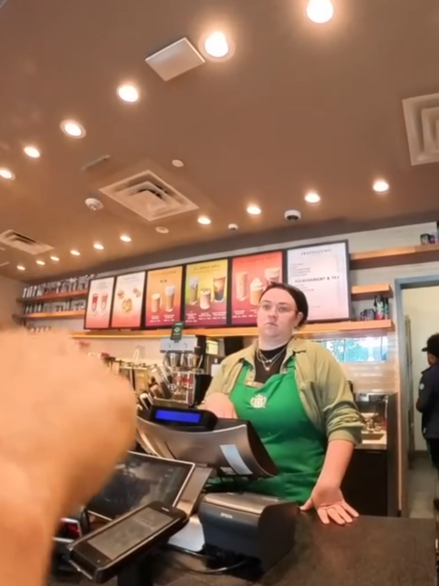 Ordering at America's only Deaf Starbucks in sign language