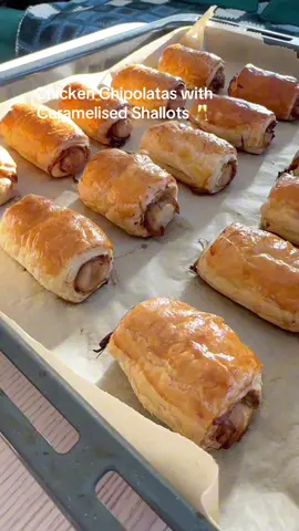 12 Days of Christmas Appetizers 🎅 Pt 3  aramelised Shallots  6-8 small / medium shallots  Water  1 x tbs brown sugar  1 x tbs balsamic vinegar  1 x puff pastry sheet  10 x Chipolatas  Rosemary  1 x egg yolk mixed with 1 tsp milk  Start by caramelising your onion. Heat up your pan. Chop them very thin and add some olive to the pan. Add the onion and stir for about a minute. Add 1/4 x cup water and let it evaporate, reduce heat to medium low and cook for 15 min stirring every few minutes, if the onions start to stick add a splash of water. After 15 min add the sugar and vinegar and cook for another 5 min. Preheat oven to 180C. Cut your pastry sheet into 3 lengthways. Cut one sausage into 3 as I used 3 and 1/3 sausages in each. Spread 1/3 of the shallots to the base and some rosemary then your sausages. Fold the pastry over to create a roll and then cut into 5. Repeat the same with the other 2 pieces of pastry creating 15 rolls. Add to a baking tray with parchment paper. Brush all around the roll with egg wash and bake low in the oven for 40 min.  I mixed a little shallots with ketchup for sauce and these were amazing warm and cold. Enjoy D 🫶 #fyp #appetizer #pastry #christmasfood 