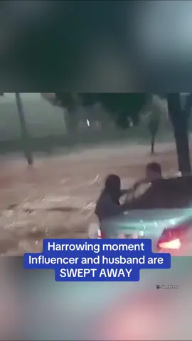 An influencer and her husband were captured clinging to their car in raging floodwaters before being fatally swept away—just minutes after the influencer made a haunting final social media post. Jeniffer Soares Martins, who had 81,000 followers on Instagram, was seen holding onto a car with her husband, Wallion Lima, as water surged past them following heavy rains that hit Uberlândia, south of Brasília, Brazil, in the early hours of November 24. That night, 2.2 inches of rain fell in just 30 minutes, causing severe flooding in the city of over 700,000 people. Moments before the flood, Martins shared videos of herself listening to music, with the caption: ‘I'm going to be young again.’ 🎥 Jam Press #brazil #floods #influencer #southamerica 