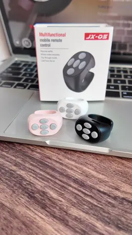 💕💕 You can slide videos without touching your phone. It's this remote control that looks like a finger ring. It comes with its own organizer and on this there are five manipulable buttons. Just link the Bluetooth and you can remotely control the video like this. This remote is on sale right now, so don't miss out.😘😍#contro #controller #control #controlling #remotecontrol #bluetoothcontroller #tiktokshop #fyp #buyit 