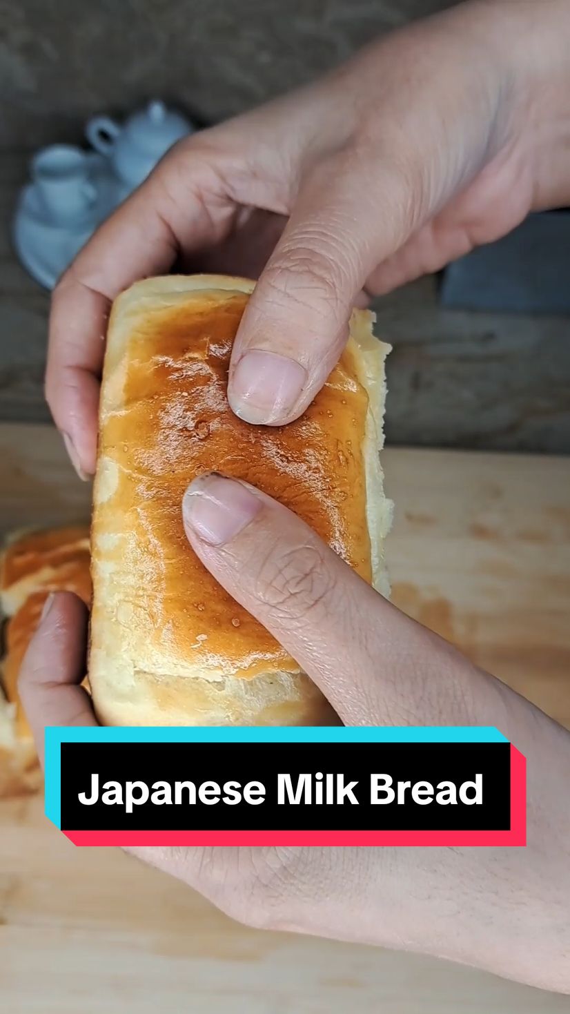 World Fluffiest and Easiest Japanese Milk Bread. The fluffiest and easiest Japanese milk bread I've ever tried using Tangzhong method. It's soft and fluffy as cloud and it can stay soft for days. 📌 ❤️ Ingredients:  Tangzhong: 17g bread flour  85g water  310g bread flour  12g whole milk powder  35g sugar 5g yeast  47g soft unsalted butter  1 tsp salt (5g)  70g warm milk  1 large egg (50-55g)  Tangzhong Bake at 170°C for 20-25 minutes .  . . . . . #foryou #fyp #foryoupage #bread #milk #milkbread #breadrecipe #soft #softbread #bakerybread #japanesemilkbread #trending #dailyhub 