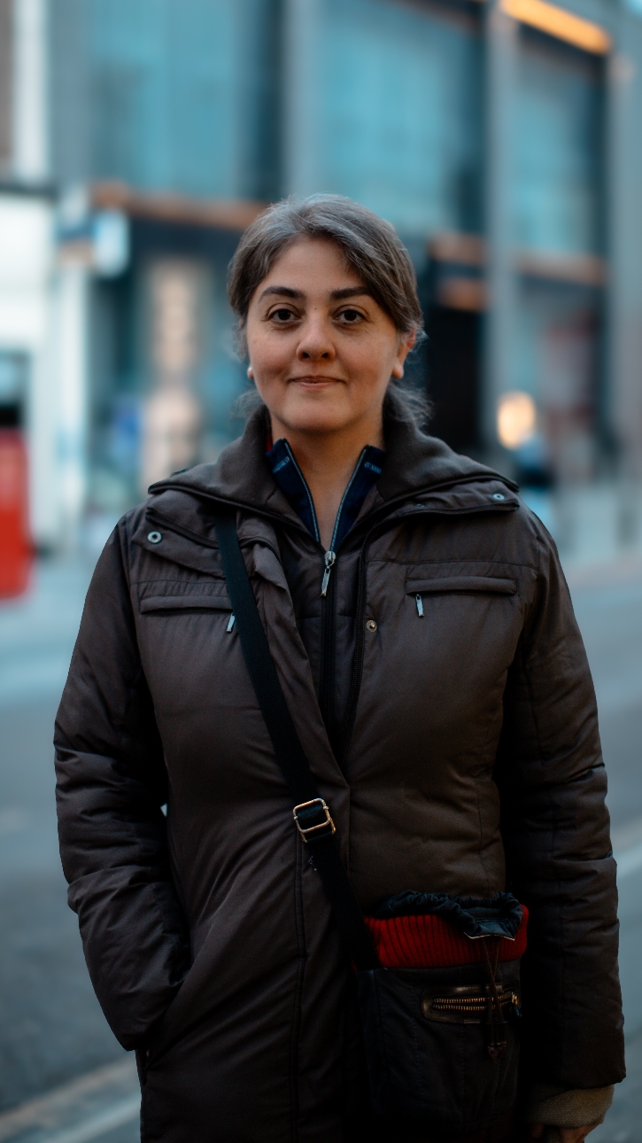 Shima wore a standard brown puffer jacket but had a natural elegance about her which I loved. A warm smile and a warm grace. #streetportrait #naturalbeauty #fashion #effortlessstyle #urbanvibes #winterfashion #timelesscharm #citystreets #candidmoments #beauty 