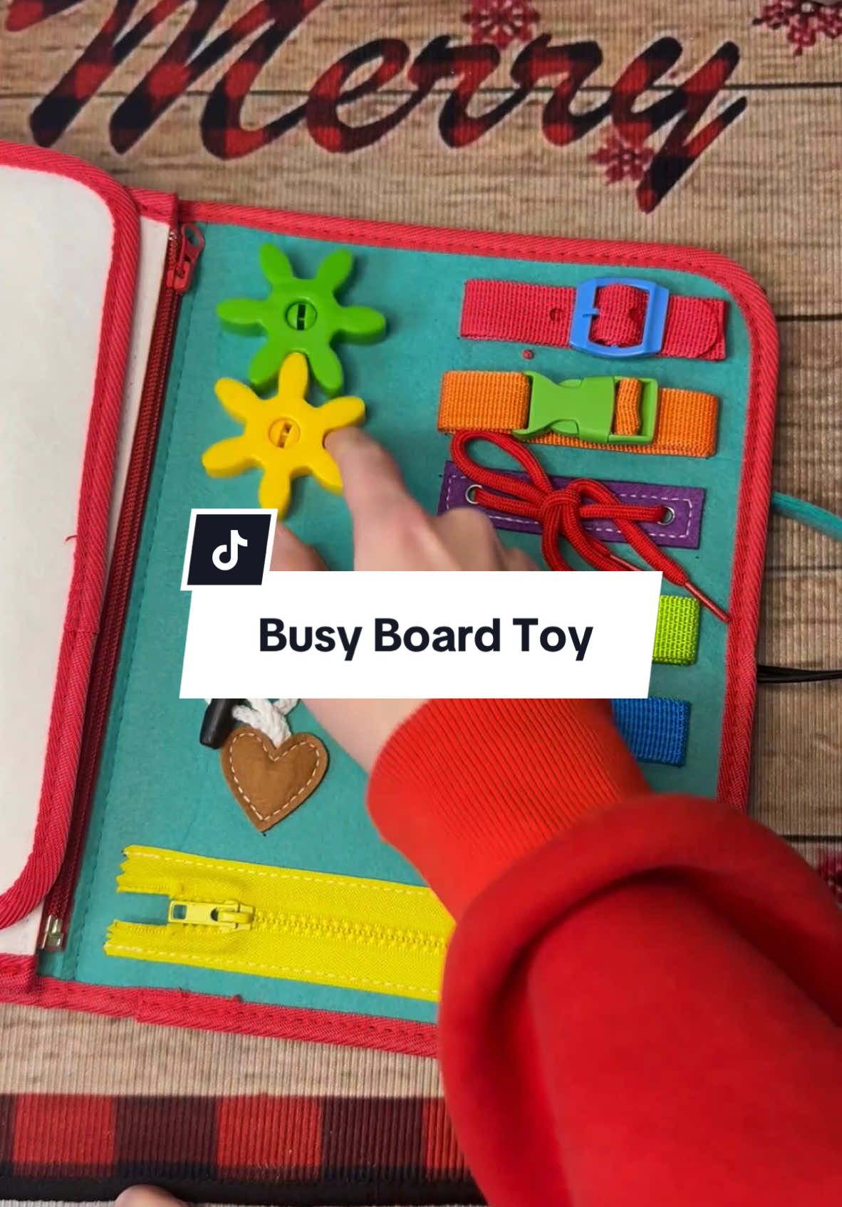 Busy board Montessori briefcase for kids. This would make a really good Christmas gift for any kiddo or toddler! I even heard somebody say this would be really good for seniors. #MontessoriToy #Toy #KidsToy #GiftsForKids #BusyBoard #FidgetToy #toysforkids #christmasgiftideas #giftguide #treasurefinds #giftsforkids #christmasgift #giftforher #giftforhim 