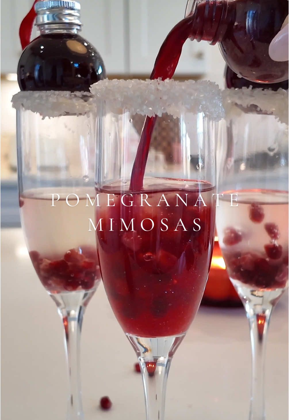 pomegranate mimosas for christmas season 🥂🎀 #cocktails #cocktail #holiday #christmas #christmasideas #holidaycocktail #holidayparty #christmascocktails #christmastiktok #drinkideas #christmasdrinks #aesthetic #viral