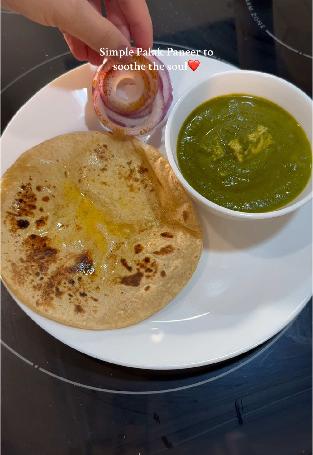 Quick, healthy, and absolutely comforting – this #palakpaneer is a staple in our home! It’s packed with nutrients and brings so much warmth to our busy days. With just a few simple ingredients and done in no time🌿✨ #BrownMomLife #healthyeating #quickmeals  Ingredients: 	•	Oil 	•	Ginger, garlic, onion, green chili, tomatoes, palak (spinach) 	•	Cumin, dry red chili, hing, salt, red chili powder, coriander powder 	•	Paneer cubes 	•	Cream (heavy cream as per preference) Method: 	1.	Heat 1/3 tbsp oil and sauté chopped onions, garlic, ginger, and green chili for 2-3 minutes. 	2.	Add chopped tomatoes and cook well, then add spinach. Cook for 2-3 minutes. 	3.	Let the mixture cool down and grind it into a smooth puree. 	4.	In a pan, heat desi ghee, add hing, cumin, and dry red chili. Sauté garlic until golden. 	5.	Add the ground spinach puree, followed by spices (salt, red chili powder, coriander powder). Mix for 10 seconds. 	6.	Add water to adjust the consistency as per your preference, and cook for 2-3 minutes. 	7.	Add paneer cubes and cook for a few minutes until they absorb the flavors. 	8.	Stir in cream and mix well. Serve hot with chapati or naan.  #quickandeasyrecipe #simplecooking #soulfood #EasyCooking #momlife #busymom #HomeCookedMeals #foryou #cooking ##gharkakhana #browntiktok #punjabitiktok #punjabiindustry #simplefood #fyp #internationalcouple #internationalstudent 