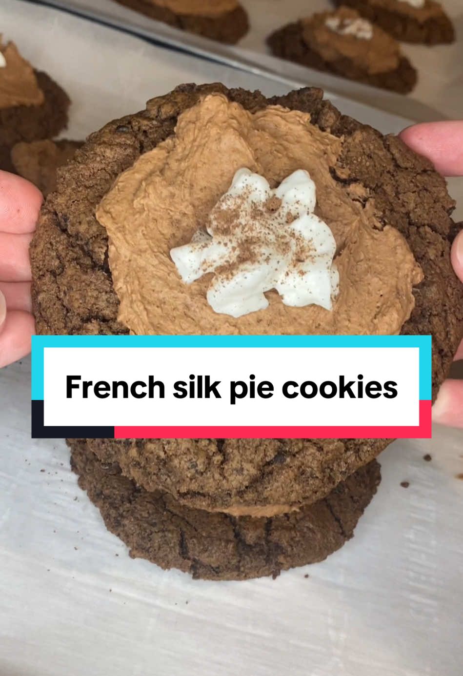 French silk pie cookies! 🍪 Oreo Cookie Base ﻿﻿1 & 1/2 cups unsalted butter - softened to room temperature ﻿﻿1 & 1/2 cups light brown sugar - packed ﻿﻿1 cup granulated sugar ﻿﻿2 large eggs ﻿﻿1 tablespoon vanilla extract ﻿﻿3 cups + 2 tablespoons all-purpose flour - 450 grams. (see notes!) ﻿﻿1 cup black cocoa powder - yes, needs to be BLACK cocoa powder ﻿﻿2 & 1/2 cups Oreo crumbs - (I used regular Oreos, and you want to crush the filling and cookies... all of it!) ﻿﻿1 & 1/2 teaspoons baking soda ﻿﻿1 teaspoon baking powder ﻿﻿1 teaspoon salt Chocolate Mousse ﻿﻿3.4 oz chocolate instant pudding ﻿﻿2 cups heavy cream - cold ﻿﻿1/2 cup 2% milk - cold ﻿﻿2/3 cup powdered sugar 3 tablespoons Dutch process cocoa powder ﻿﻿1 teaspoon vanilla extract Topping ﻿﻿whipped cream ﻿﻿chocolate shavings Directions: Preheat oven to 365 degrees  In bowl of a stand mixer cream the butter, brown sugar, and sugar on medium speed for 2 minutes. Add the eggs and vanilla and mix to to combine. Scrape down the sides of the bowl with a rubber spatula. Add the flour, black cocoa powder, Oreo crumbs, baking soda, baking powder, and salt. Mix to combine. Portion the dough into 1/4 cup sized balls. Place 6 balls of dough on the baking sheet. Using the palm of your hand, press down on each cookie dough ball just slightly. Bake for 11 minutes. Remove from oven. After doing this press the bottom of a ½ cup or 2/3 measuring cup (or any measuring cup that is smaller than the cookie, as we want to create a small 