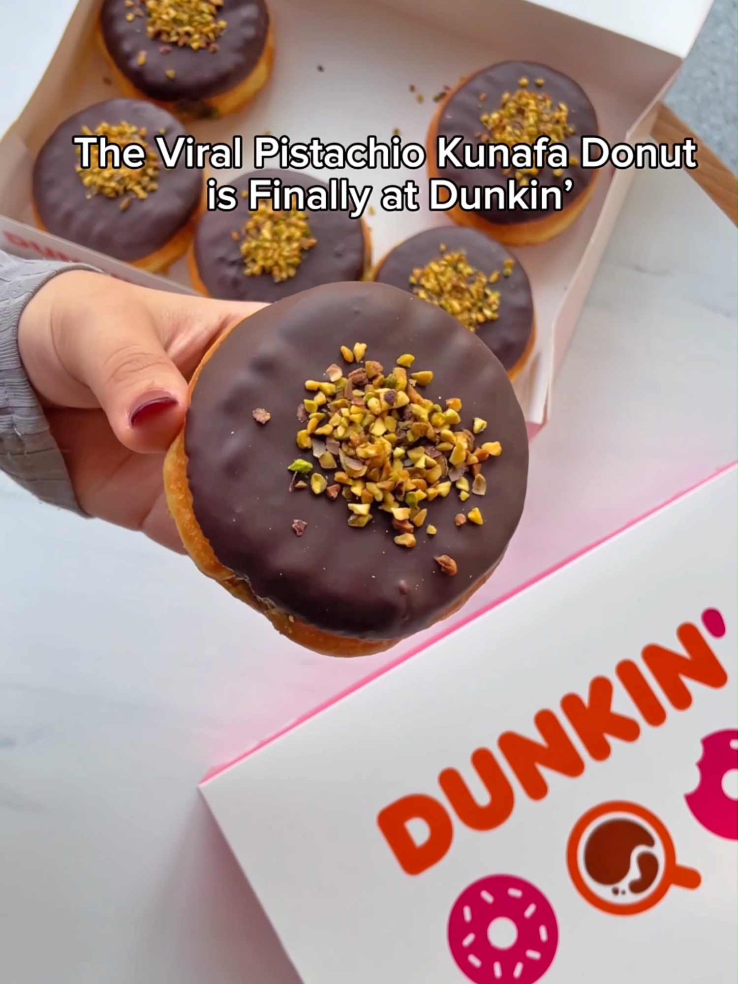 Drumroll, please...🥁 The Viral Pistachio Kunafa Chocolate Donut is officially at Dunkin’! 🍩