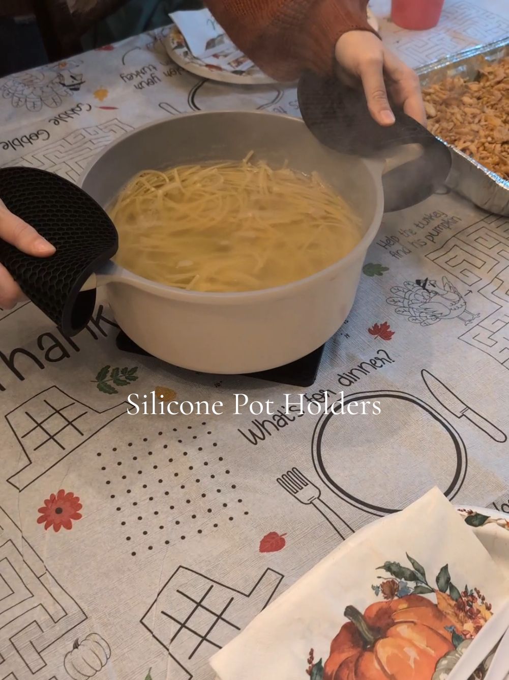 The silicone pot holders are so nice and so inexpensive!! Don't go through the holidays without them! A kitchen must-have! #Cook #Cooking #Kitchen #kitchengadgets