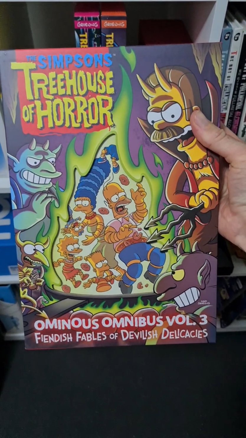 The Simpsons Treehouse of Horror Ominous Omnibus Vol 3. Such a great collection of books! #thesimpsons #treehouseofhorror #bart #Homer #Marge #90s #90skids #bookcollection 