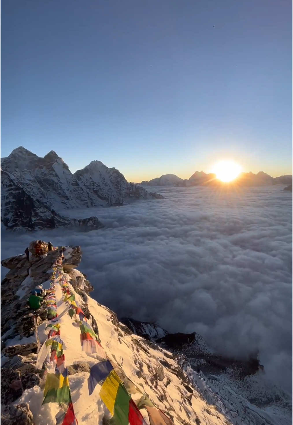 Golden hour magic from Ama Dablam Camp 1 🌅✨Clouds dancing beneath the sunset-pure Himalayan bliss. #amadablammountain #beautifulview #cloudy #camp1 #nepal #adventuretime #mountain #moutainlife #himalayan #goldenhour #goldenvideography #sunset #videography #naturephotography #satori #travelphotography #travelblogger #sherpa #gyalzean