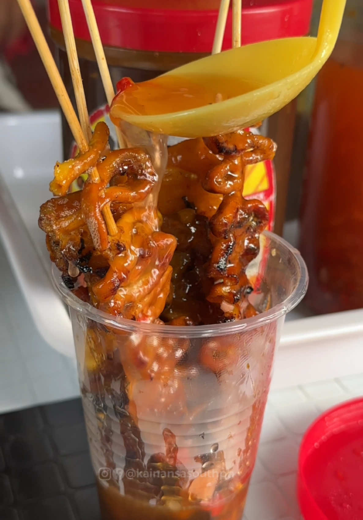 Softdrinks in plastic + isaw! Perfect combo! #kainansasouth #pinoy #isaw #pinoyfood