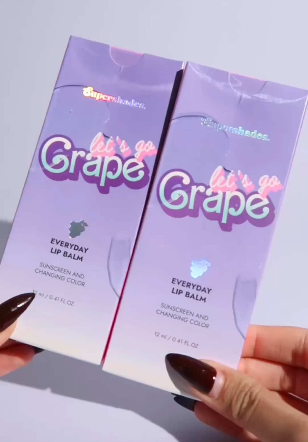 🍇Let’s go grape 🍇 ក្រែមទំពាំងបាយជូរ 🍇  💋មកជាមួយ ពណ៌ស្រាលស្រទន់សម្រាប់គ្រប់វ័យ មិនថា នារី រឺបុរស អាចប្រើប្រាស់បាន 😍🤗  💦មានសំណើមគ្រប់គ្រាន់ ជួយអោយបបូរមានមានសំណើម ទន់រលោង  ☀️មាន SPF25 ការពារបបូរមាត់ពីភាពស្ងួតប្រេះ និង ការពារពីការឡើងខ្មៅ ✨ប្រើប្រាស់ដោយសុវត្ថិភាព មិនបារម្ភបញ្ហាបបូរមាត់ខ្មៅទៀតឡើយ 👍👍👍 #supershadeskh #supershades #letsgoblack #letsgoblue #letsgogrape #fyp #foryou #viral #lipbalm #lipoil