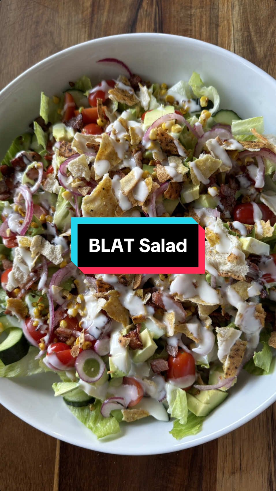 BLAT salad 🥗  1/2 to 1 cos lettuce 1 cucumber 1 punnet cherry tomatoes 1 avocado Thinly sliced red onion to taste 1 corn cob, kernels removed and dry fried 2 bacon rashes diced and fried Dressing of your choice, I use ranch To make the pita crisps, spray a pita bread with oil and shake on your fav seasoning, I used morrocan but you can use garlic or paprika or both. Add salt and bake in a hot oven until crisp, approx 3 mins. Once cooled, break into shards.  #summervibes #salad #saladrecipe #blat #DinnerIdeas 