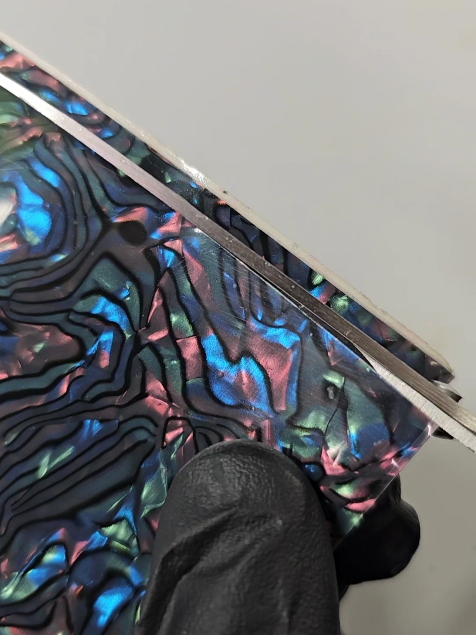 Quick Idea! 💡  Using a faux abalone sheet to make an inlay ring, full vid coming soon. This stuff is great, so easy to cut into thin strips and super quick to make stunning resin jewelry! Full vid with links coming soon to my YoobyToobe.  Resin art, resin, resin jewelry, resin jewellery, jewelry making, jewellery making  #resinart #resin #resinjewelry 