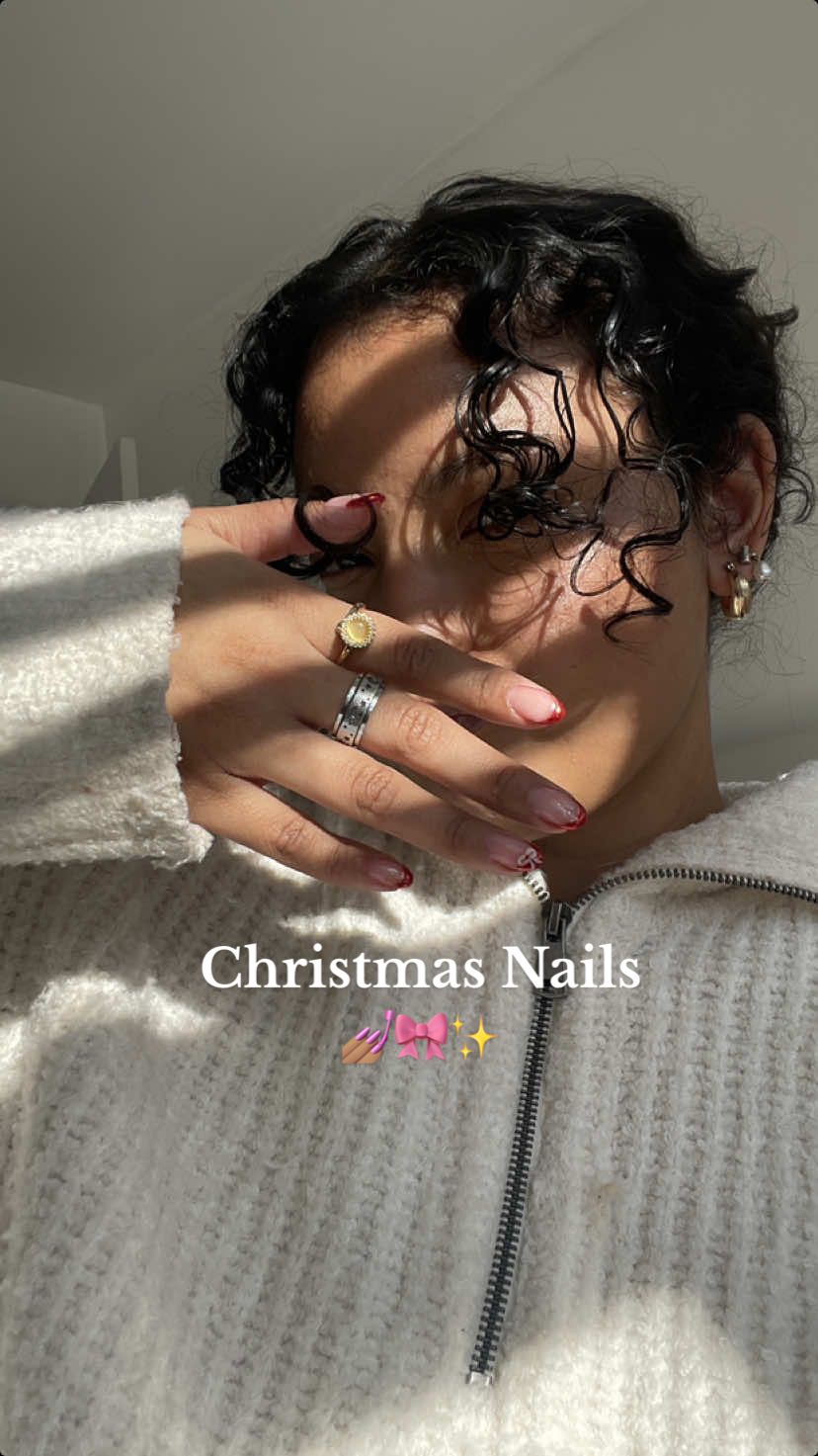 Red french nails w the bow Quit playiiinnnnnn. #christmasnails #nailinspo #almondnails #holidaynails #nailtransition #christmastime #fyp #foryoupage 