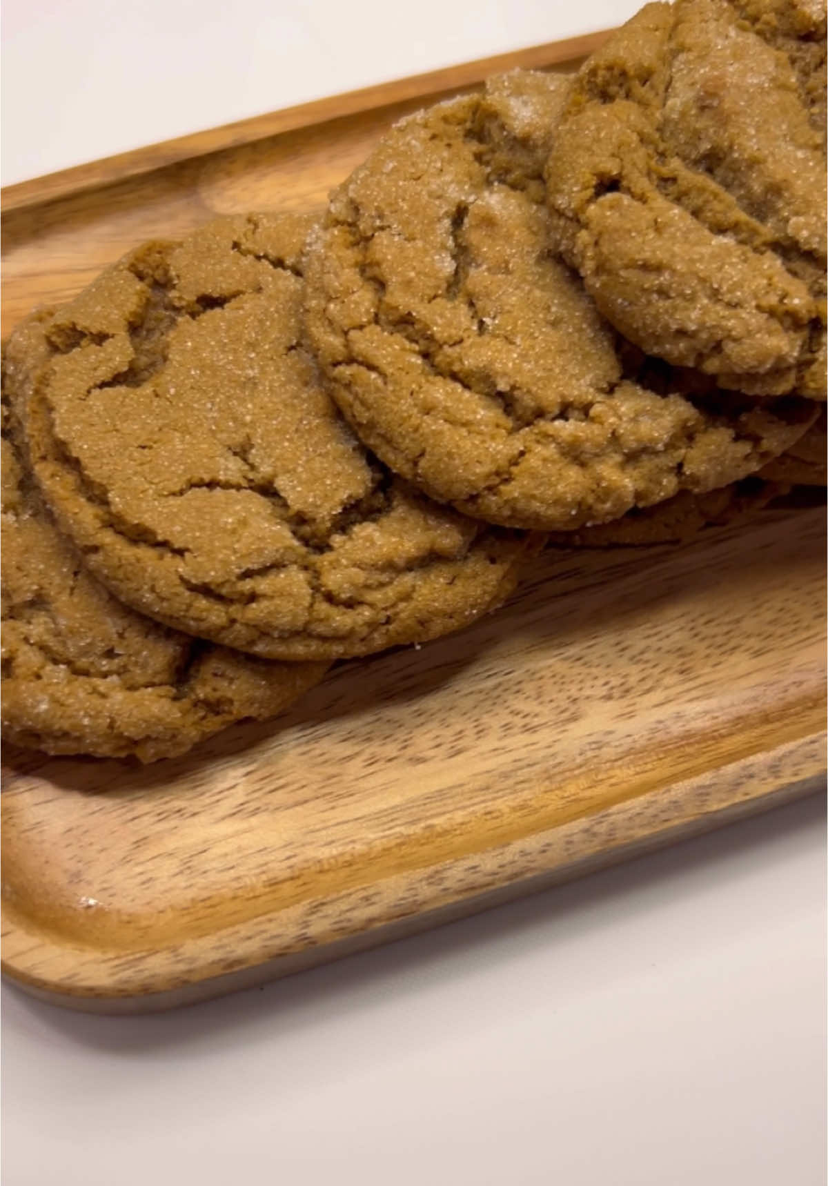 MOLASSES COOKIES!! INGREDIENTS: * 1 cup butter flavored Crisco (1 stick) * 1/2 cup butter (1 stick)  * 2 cups sugar * 2 eggs * 1/2 cup of molasses  * 4 cups flour  * 2 teaspoons baking soda * 2 teaspoons cinnamon * 2 teaspoons ground cloves * 2 teaspoons dried ground ginger * 1/2 teaspoon salt  ((1 additional cup of sugar to roll dough balls in)) DIRECTIONS: 1️⃣Preheat oven to 375°.  2️⃣Measure dry ingredients into a bowl and set aside.  3️⃣In a large mixing bowl (this can be done with a hand mixer, or KitchenAid mixer) add Crisco stick and softened butter. Cream together. Add eggs and mix well well. Add molasses and mix.  4️⃣Slowly add dry ingredients. When all mixed, use cookie scoop or form dough balls and place in a bowl with the additional cup of sugar. Lightly toss or roll dough balls to cover with sugar. Place dough balls on silicone baking mat on a cookie sheet, or greased cookie sheet.  5️⃣Bake for 10 to 11 minutes (depends on size of dough ball and chewiness/crispiness desired). Remove from oven and place cookies on cooling rack.  ENJOY!!! #molassescookies  #molasses  #easycookies  #easymolassescookies  #cookies #Foodie #deliciouscookies  #bakingcanbefun  #BakeWithMe #baking #delicious #tastyfood #tastyfood #dessert #holidays #foodies #FoodTok #mimiskitchen 