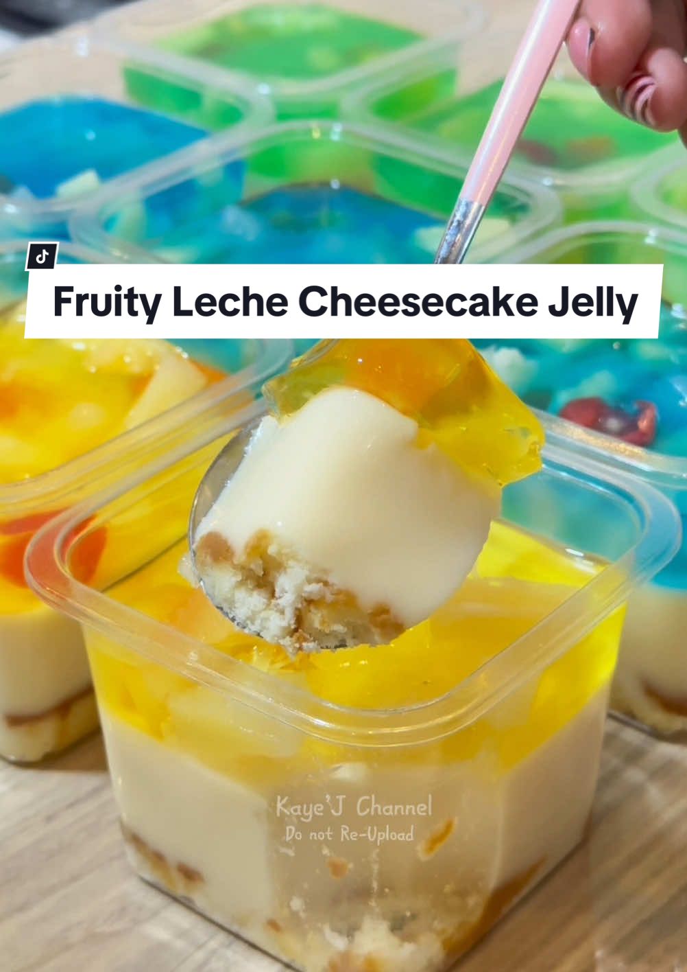 Fruity Leche Jelly Dessert Ingredients  Lemon Square Cheesecake Fruit Cocktail Flan Mixture: 3 whole eggs 1 can condensed milk 410ml Evaporated Milk 1tsp vanilla extract 3tbsp cornstarch  Clear Jelly Powder 800ml Water Colored Jelly: Clear jelly powder 500ml water 300ml fruit cocktail syrup Food color (blue, green yellow)  Chill before Serve!! Happy 🫶👩‍🍳#EasyRecipe #dessert #EasyRecipes #fyp #Foodie #Recipe #jellydessert #nochebuenadessert 