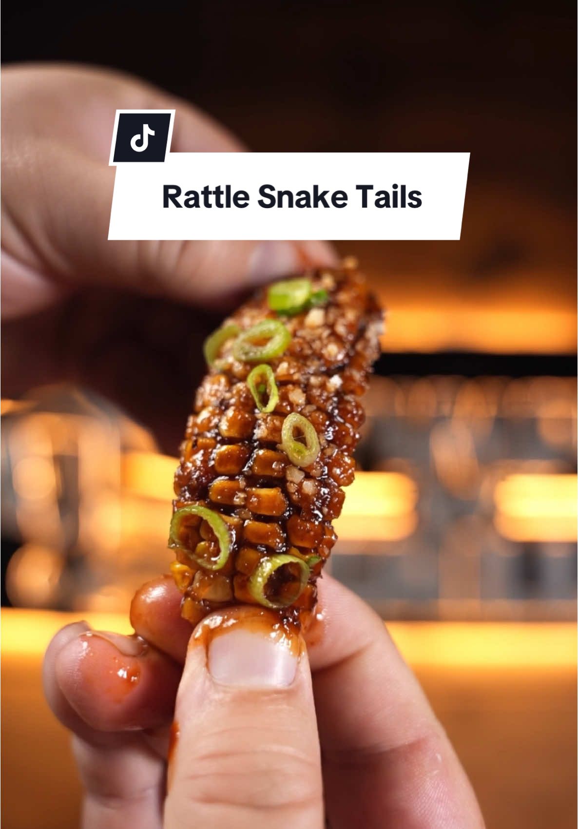 Rattle Snake Tails 🌽🐍 Recipe below ⤵️⤵️ The Slide out Rack system from @PimpMyGrill is the leading manufacturer for upgrading/pimpin out your grill. They have rack systems for GMG, Traeger, Camp Chef, RecTeq & Coming soon - PitBoss, Ggrills Grills, & Zgrills! Plus many more awesome upgrades for your smoker!💥 Serves 14-16ppl Prep Time: 8 Minutes  Cook Time: 1 Hr 10 Minutes  Ingredients:  8 ears of Corn  1 oz @Derek Wolf Sweet Carolina Blonde Pork Seasoning  8 Tbsp Butter 5 oz @FYRSTARTER HNY FYR bbq sauce  2 oz Cotija  1/2 bunch Green Onions  For the Corn Ribs:  1. Boil Corn for 10 minutes and let rest for 5 minutes  2. Cut Corn into 8 pieces  3. Lay Corn Tails on a baking sheet and lather on the seasoning butter  4. In the Smoker at 375 degrees for 45 minutes  5. Then rub FYR HNY Bbq sauce on and smoke for another 15 minutes  6. Garnish with Cojita and green onion #corn #ribs #rattlesnake #tails #Recipe