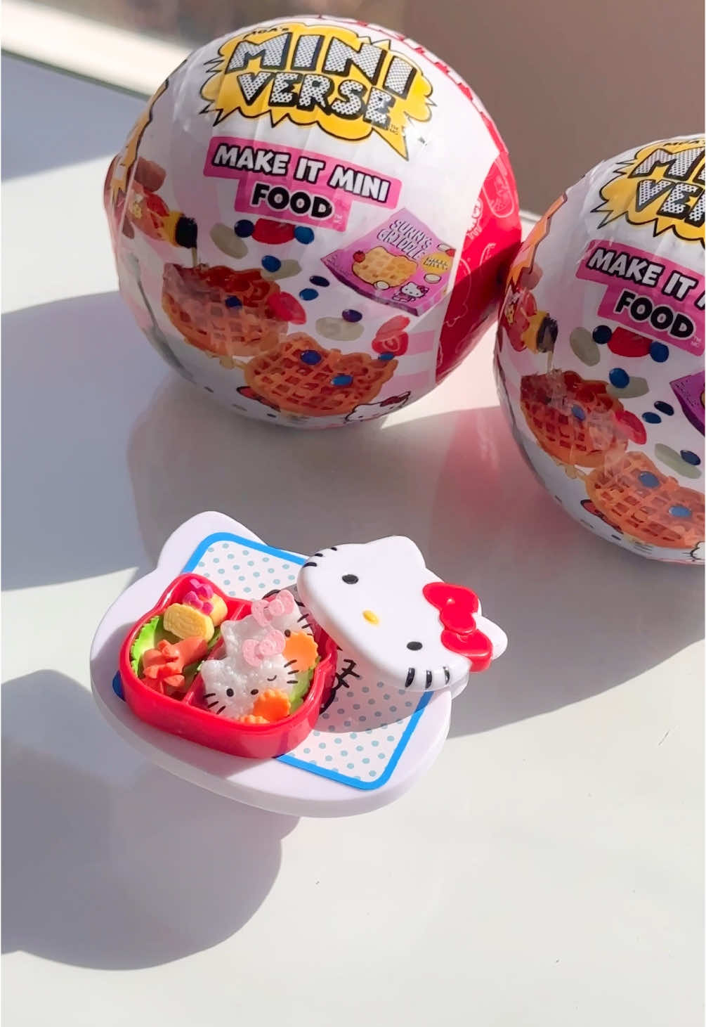 save and send to your hello kitty besties 🎀 unboxing the new @Miniverse x @hellokitty collection ASMR edition! each ball is a surprise and comes with realistic mini items to make your own minis of your favorite Hello Kitty themed foods! brb on my way to collect them ALL. 🥹available now at all major retailers #ad #Miniverse, #MiniverseFood, #MakeItMini, #MiniverseHelloKitty