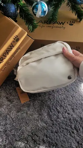 Here’s the updated version with the correct mention:   This small bag holds so much! 👜 Perfect for long walks, travels, and runs. 🏃‍♀️✈️ @BEARPAW Shoes 🐻🐾    #bearpawshoes  #travelbag  #everydaybag  #adventureready  #compactandstylish  #activelifestyle 
