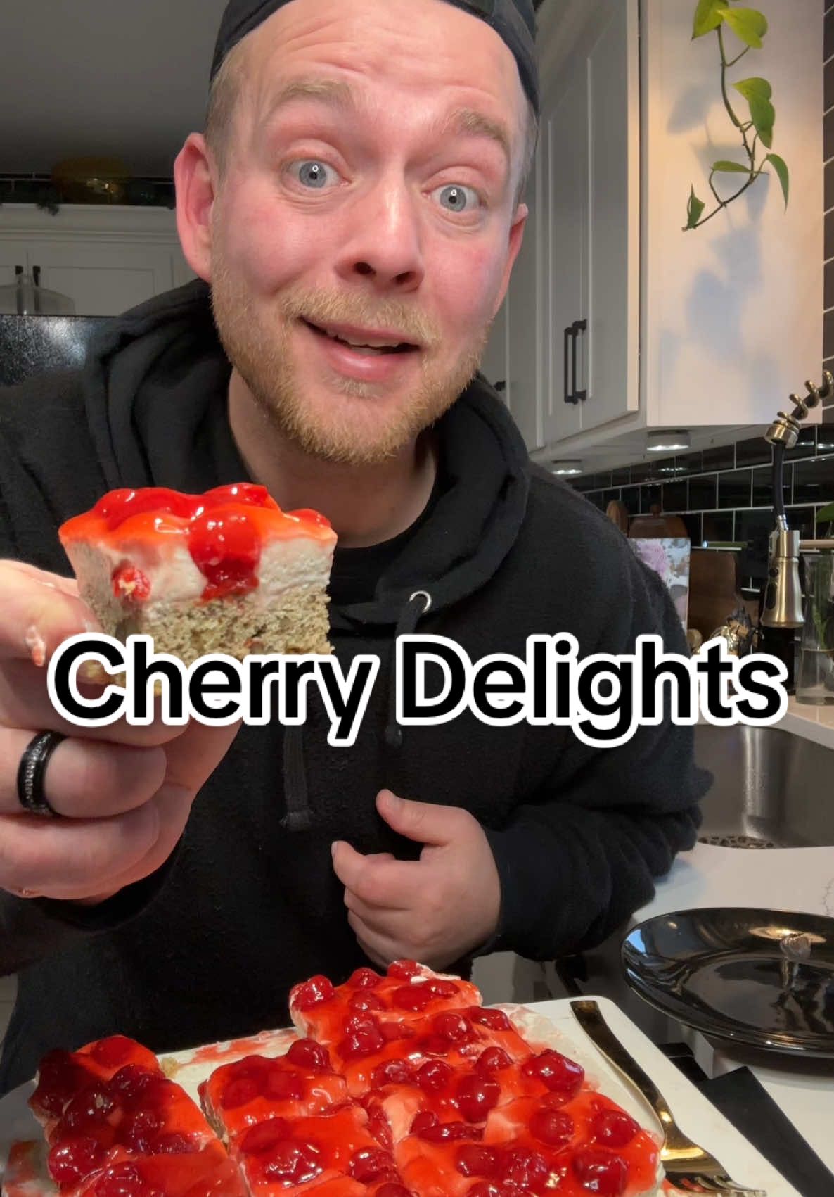 Cherry Delight is another easy recipe you need 😁 #cherry #delight #cherrydelight #EasyRecipe #try #fyp  Cherry Delight  For the Crust:  1 C. Flour 2 TBS. Sugar  1 tsp. Baking Soda  1/4 tsp. Salt  1 Egg (beaten)  1/4 C. Butter (melted) 1/2 tsp. Vanilla  1/2 C. Pecans (chopped)  For the Cream Cheese layer:  8 oz. Cream Cheese (softened) 1/2 C. Powdered Sugar  1 tsp. Vanilla  1 C. Heavy Whipping Cream  For the Topping:  15 oz. Cherry Pie Filling Mix crust ingredients together until combined mix in nuts. Press evenly into a 9x9 square pan (use a larger pan for a thiner crust).  Bake at 350°F for 15 minutes. Remove from oven let cool.  Mix together the cream cheese, sugar, and vanilla until the mixture is smooth. Whip the heavy cream til stiff then fold whipped cream into the cream cheese mixture until fully incorporated.  Evenly spread over the crust.  Top with the cherry pie filling or with your favorite pie filling.  Chill the Cherry Delight to firm up (4+ hours for best results).  Slice into desired size portions.  Store covered in the fridge for several days. 