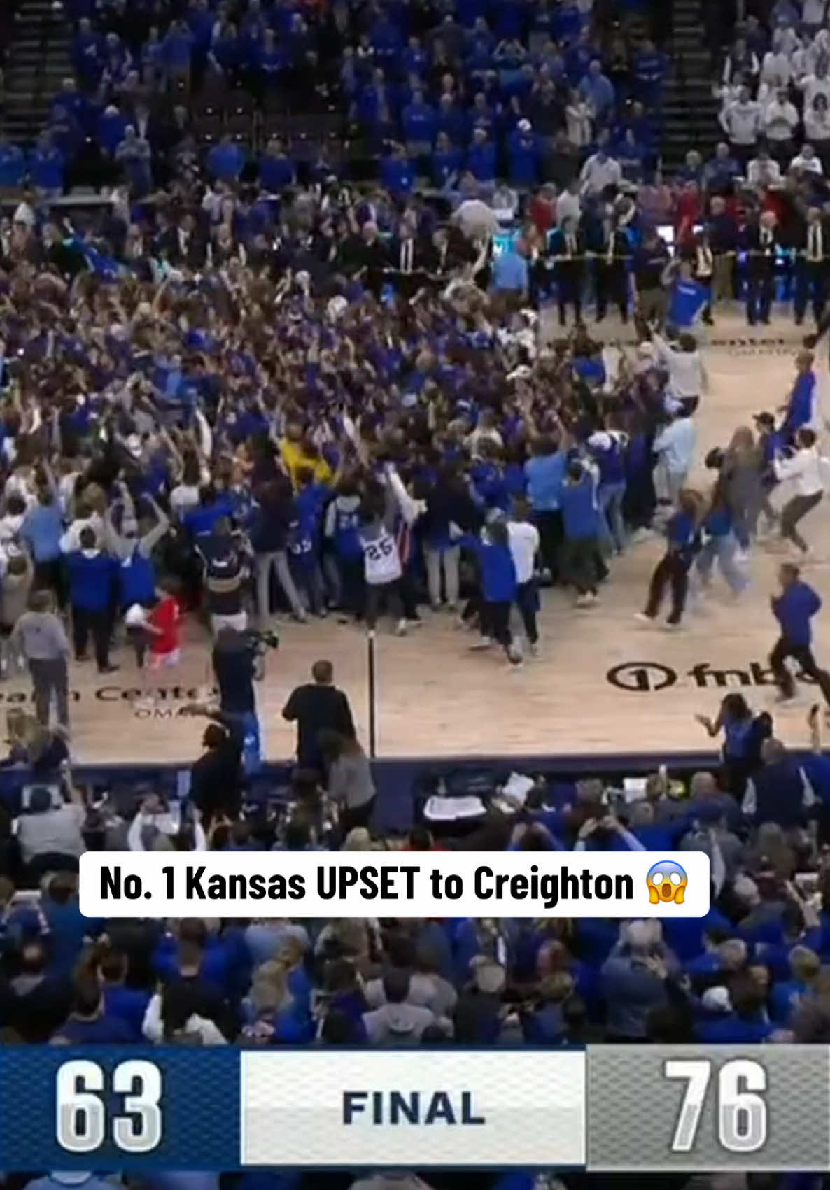 Fans storm the court in Omaha 🔥 #mbb #collegebasketball #basketball 