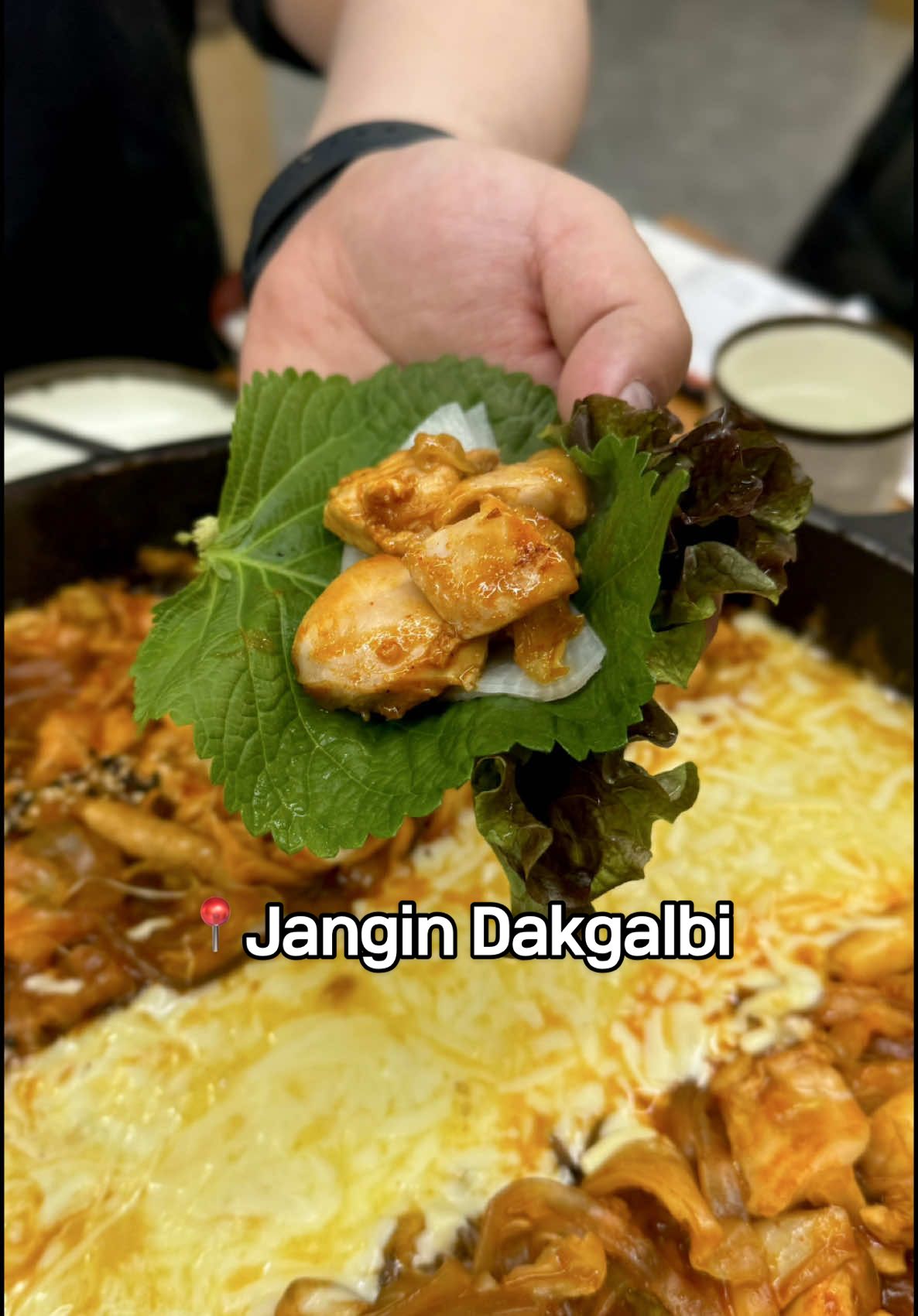 ‼️ MUST TRY SPICY STIR FRIED CHICKEN IN KOREA ✨ 🌶️ enjoy a large skillet of chicken, potatoes, cabbage and rice cakes in a mild/medium/spicy sauce (we chose mild) for roughly $13AUD per person at Jangin Dakgalbi. Their side dishes are self serve and unlimited  🧀 if you love dipping food in a gooey cheesy melt, mozzarella cheese if a must order! 🍚 save some of the chicken to order their signature finale fried rice for an extra KRW3,000, which is mixed altogether to create a delicious and crispy fried rice. Pro tip: add some perilla leaves on top from the side dish bar for the most authentic Korean experience 😊 ##mustvisit##dakgalbi##korea##koreanfoodie##myeongdong##koreanfood##foodreels##koreatravel##Foodie##jangindakgalbi##chicken##닭갈비##명동##인스타푸드##푸디#장인닭갈비