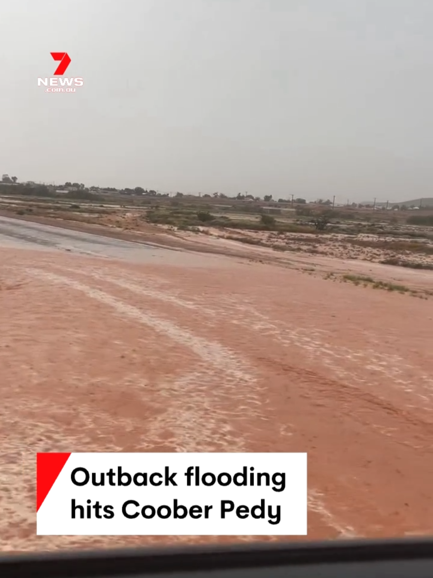 Flash flooding has struck Coober Pedy, temporarily leaving parts of the opal mining town without power. #7NEWS