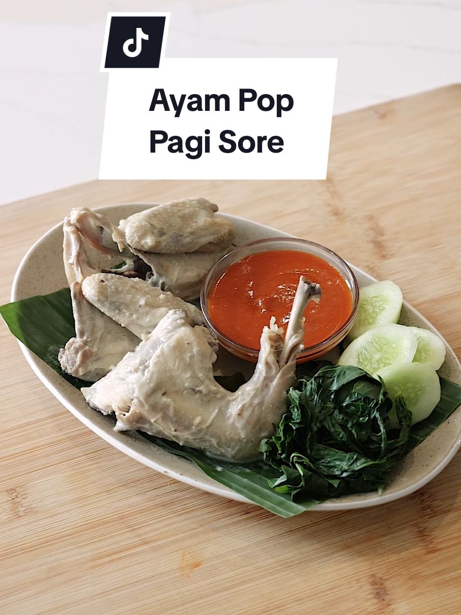 Resep Ayam Pop Khas Pagi Sore (untuk 8 porsi) Bahan: 2 ekor ayam pejantan, potong 4 bagian 6 siung bawang putih 3 lembar daun salam 6 lembar daun jeruk 2 batang serai, geprek 4 cm jahe, iris Bahan lainnya: 1 sdm garam ½ sdm kaldu jamur/penyedap 1/6 sdt merica 100 ml santan 600 ml air kelapa 600 ml air Bahan sambal: 8 siung bawang merah, potong 5 siung bawang putih, potong 1 buah tomat merah, potong 7 buah cabai merah tanjung, potong 1 sdm gula pasir 1 sdt kaldu jamur/penyedap 300 ml air ungkepan ayam pop 2 sdm tepung terigu protein sedang 60 ml minyak kelapa Pelengkap: daun singkong rebus timun Cara membuat: 1. Haluskan bawang putih dengan sedikit air hingga benar-benar halus 2. Siapkan panci, masukkan ayam pejantan yang sudah dipotong, air kelapa, air, bawang putih halus, jahe iris, serai geprek, daun salam, daun jeruk dan santan 3. Tambahkan garam, kaldu jamur dan merica. Aduk rata dan masak dengan api sedang kecil selama kurang lebih 30 menit sambil ditutup 4. Untuk sambal, panaskan minyak kelapa lalu masukkan bawang merah, bawang putih, cabai merah tanjung dan tomat merah yang sudah dipotong-potong. Tumis hingga wangi 5. Tambahkan air ungkepan ayam pop ke wajan, masak kembali hingga bahan-bahan menjadi lunak 6. Masukkan bahan-bahan sambal yang sudah dimasak ke gelas blender, tambahkan tepung terigu, gula pasir dan kaldu jamur. Haluskan hingga benar-benar halus dan saring sambal 7. Tiriskan ayam yang sudah matang dan siram dengan sedikit air ungkepan ayam pop 8. Ayam pop siap disajikan