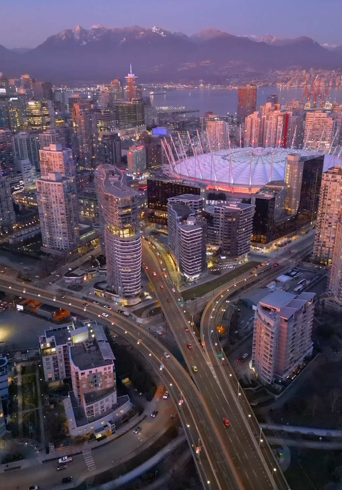 ✨ Beautiful but cold. #vancouver #yvr #vancity #skyscrapers #purpleskies #waterfront #mountains #britishcolumbia #britishcolumbiacanada #canada #aerial #photographer #vancouverdowntown #downtownvancouver #bcplace #lionsgate #northshore #northvancouver #sunset #vancitylife #yaletown #coalharbour #nightcity #citylights #dji 