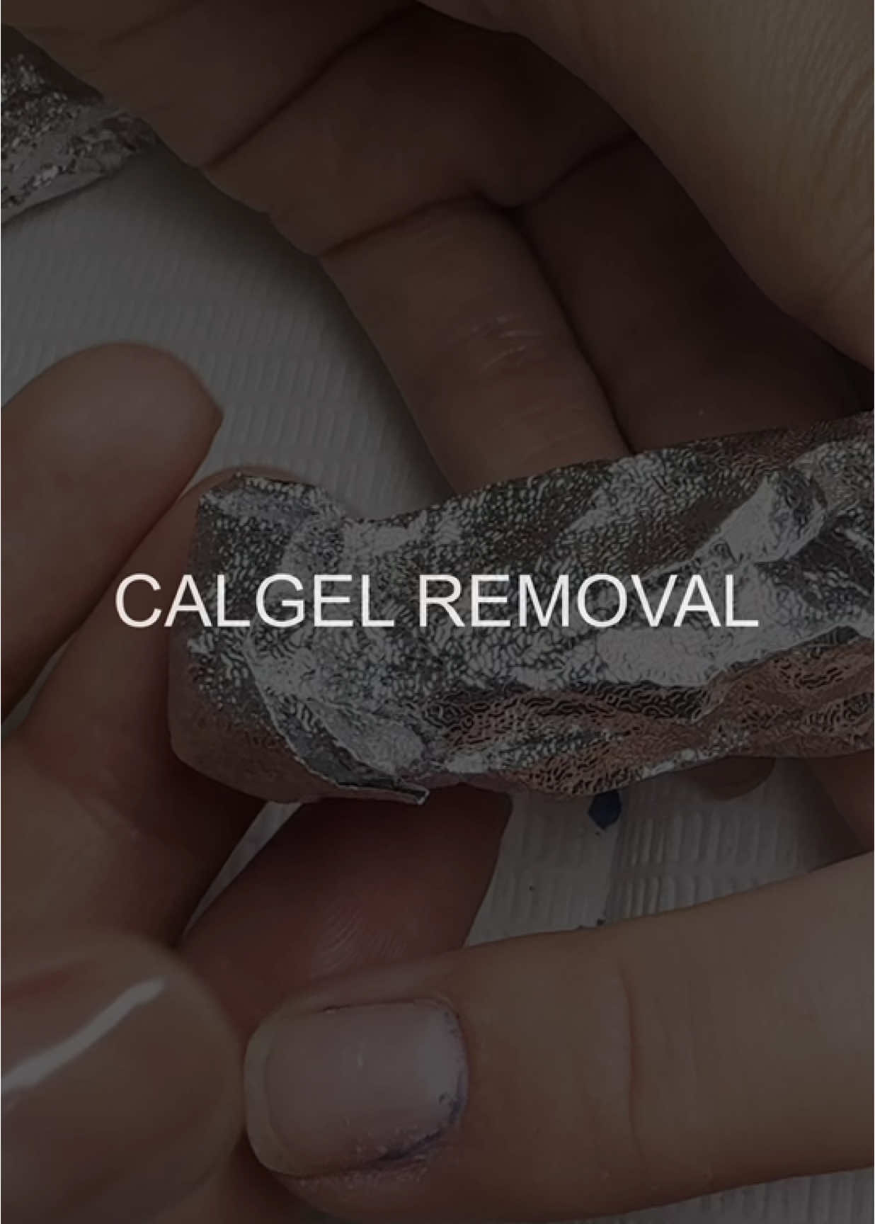 At our salon, we use a non-acetone solution for Calgel removal, ensuring a gentle process that protects the natural nail. Our method is designed to maintain the health of your nails. We start by lightly buffing the surface of the gel to allow the remover to work effectively. Then, we apply the solution and wrap your nails in special compresses. Within 10–15 minutes, the gel softens and can be easily removed without causing any damage. Once the gel is lifted, we carefully clean and shape the nails, leaving them smooth and healthy. To complete the treatment, we apply nourishing cuticle oil and a moisturizing cream to keep your nails strong and hydrated. Our removal process is safe, comfortable, and free from harsh chemicals, ensuring your nails stay beautiful, healthy, and well cared for.