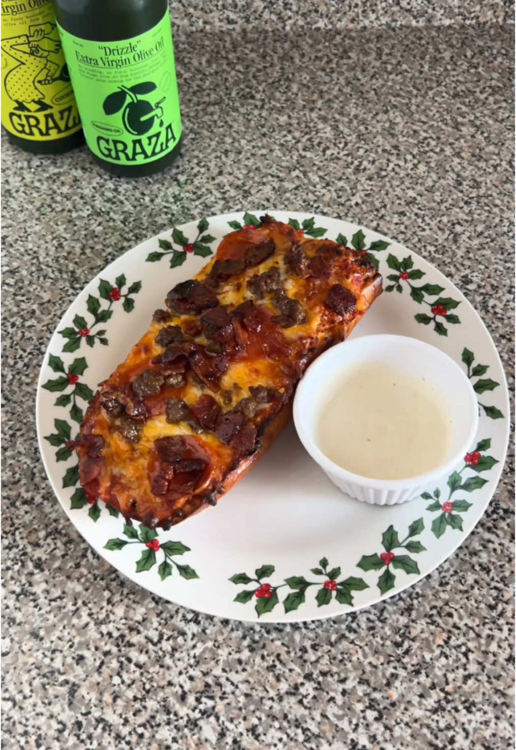 Homemade french bread pizzas with a drizzle of @Graza 🍕 #grazapartner 