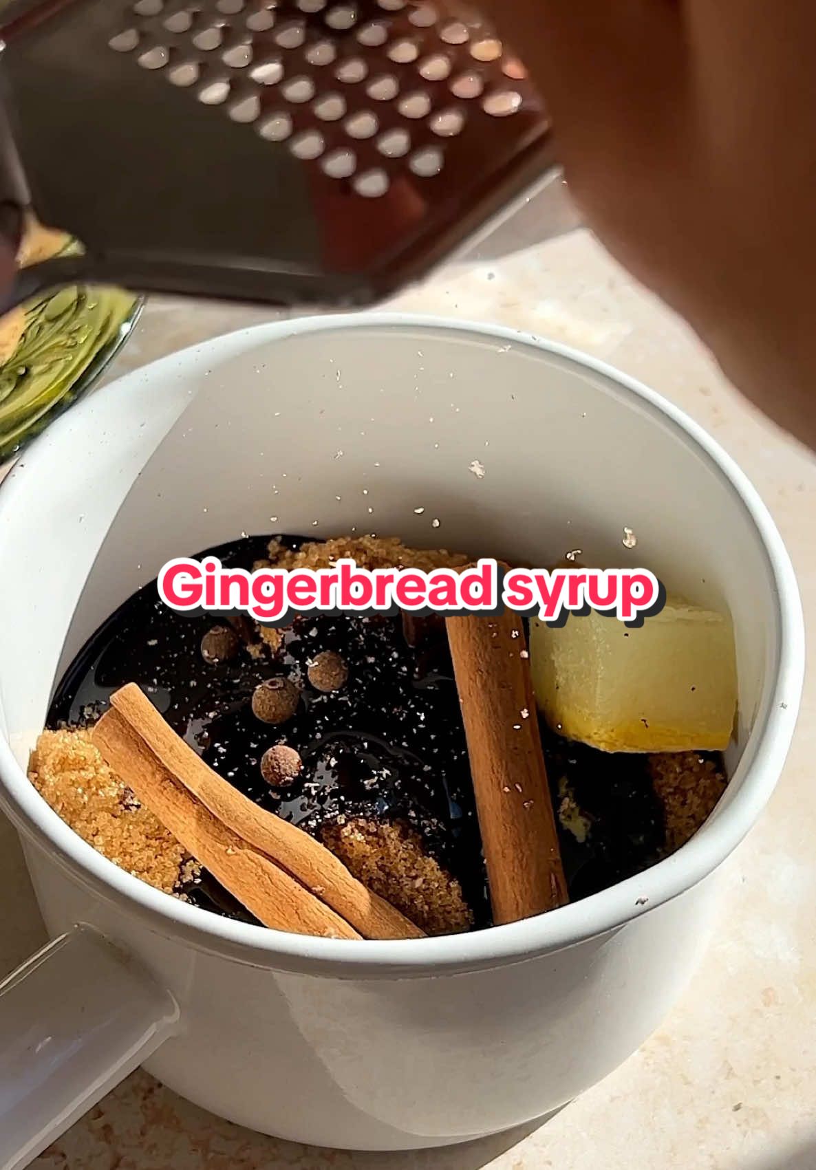 Gingerbread syrup In a medium sauce pan add: 1 cup water 1 cup brown sugar 1/4 cup molasses 2-3 cinnamon sticks 3-4 cloves, or 1 tsp ground clove 3-4 allspice berries, or 1 tsp ground allspice 1/2 tsp ground nutmeg 1 piece of ginger, I used a frozen ginger cube I made Add on medium heat and stir until sugar dissolves. Once dissolved, let simmer for 8 minutes then let cool completely. Once cool, stir in 1-2 tsp of vanilla extract. Strain & store in the fridge for up to 4 weeks!