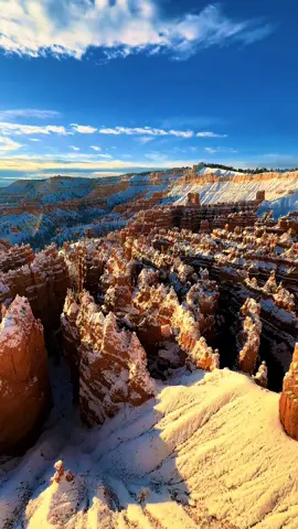 “The stark white of freshly fallen snow, red rocks, blue sky, and evergreen trees--some say Bryce Canyon is even more beautiful in winter!” #winter #wonderland #fyp 