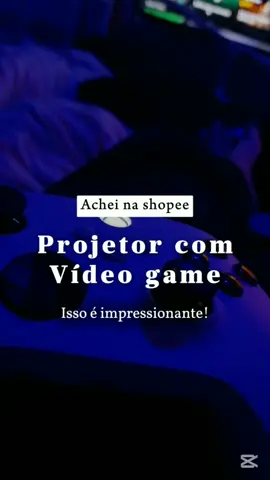 Projetor que vem com dois controles remotos e com mais de 10 mil jogos 😀 Ameii!! #controleremoto #jogosemcasa #viral_video 