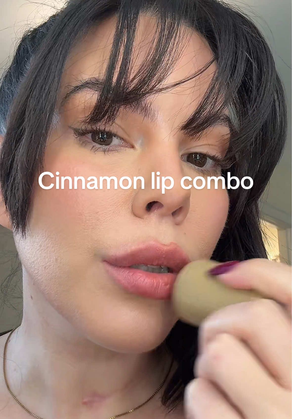 Cinnamon lip combo 🤎 @makeupbymario almond lip pencil @rhode skin toasted teddy  @Nars Cosmetics laguna lipstick #cinnamonmakeup #lipcombo #makeuptok #lattemakeup #bangs 