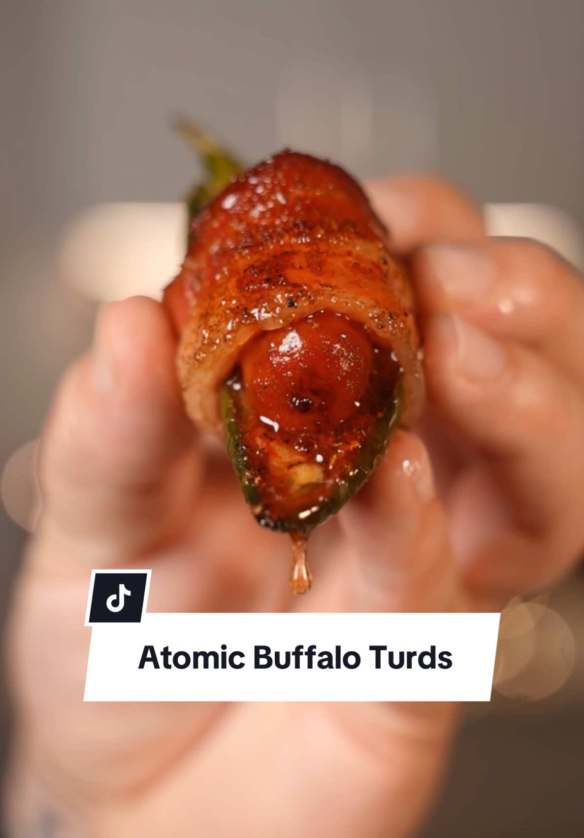 Atomic Buffalo Turds Recipe ⤵️⤵️⤵️ Makes 12 ABT’s Ingredients: 12 Lit’l Smokies 6 Jalapeños  6 Slices of Bacon 4 oz Cream Cheese  3 oz @Melinda’s Hot Sauce Berry Berry Jalapeño Pepper Jelly 4 Tbsp Sweet Preacher Rub @Fire & Smoke Society  1 oz Honey How to:  1. Slice Jalapeños in half and core out the seeds  2. Add Cream Cheese, then Jam, then a Lit’l Smokey 3. Cut Bacon strips in half and wrap around the jalapeño securing the Lit’l Smokey 4. Top with your favorite BBQ Rub 5. In the @GMG Smoker at 350 degrees for 45 minutes or until Bacon is perfect 6. Top with Honey and Enjoy!  🔥 $50 OFF Ledge Prime 2.0 🔥 $100 OFF Peak Prime 2.0 🔥 FREE RACKT Backboard (with purchase of a Prime 2.0 Grill)  🔥 50% OFF Rotisseries  Head to your local Dealer to deck your backyard out with a new GMG smoker for the Holidays! 🎄 Participating Dealers in US and CAN only, last through Dec. 31st 2024 or while supplies last! 👊🏼 #atomic #buffulo #turd #bbq #Recipe 