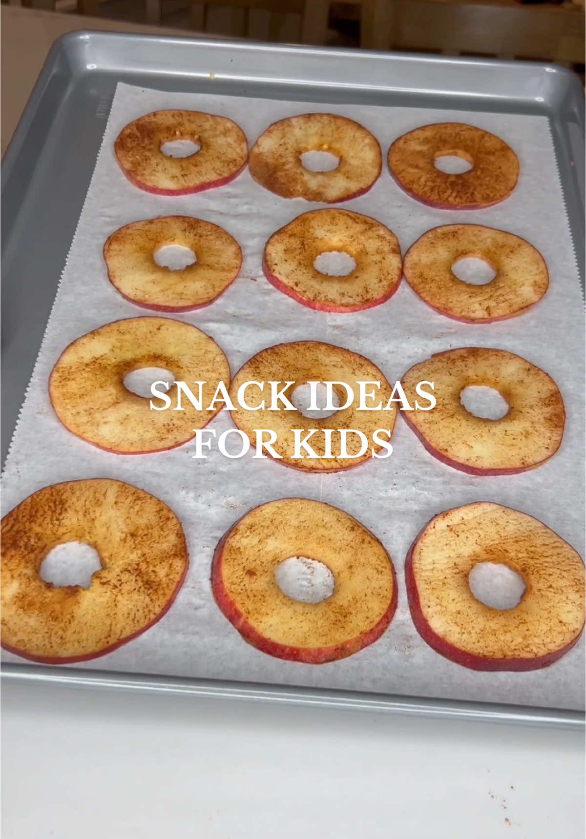 SNACK PREP: I love having some premade snacks ready to go for busy weeks. My 3 & 4 year old would snack all day if I let them! I’ll put the details for these below 🤍 . APPLE SLICES: Core a few apples and slice thinly. Toss in cinnamon (and sugar if you want) and add to a baking sheet with parchment paper (or greased). Bake at 200 for 2.5 hours. These are so good!  . BLUEBERRY MUFFINS: Mix 2 cups cottage cheese, 4 eggs, 1/2 cup honey, 1 teaspoon vanilla extract together. Once that’s mixed add in 2 cups whole wheat flour and 2 teaspoons baking powder and mix just until combined. Fold in 2 cups blueberries. Bake at 350 for 20-25 mins. . PEANUT BUTTER OAT BALLS: I mix up 1.5 cups of rolled oats in the food processor (or blender). Mix with 3/4 cup peanut butter & 3 tablespoons of honey. You can add in whatever you want to these. I just add some flax seeds. . That’s it! Enjoy 🤍 . . . #snackprep #snacksforkids #kidssnackideas #easyrecipesforkids #easyrecipesformoms #snackideasforkids #snackideas 