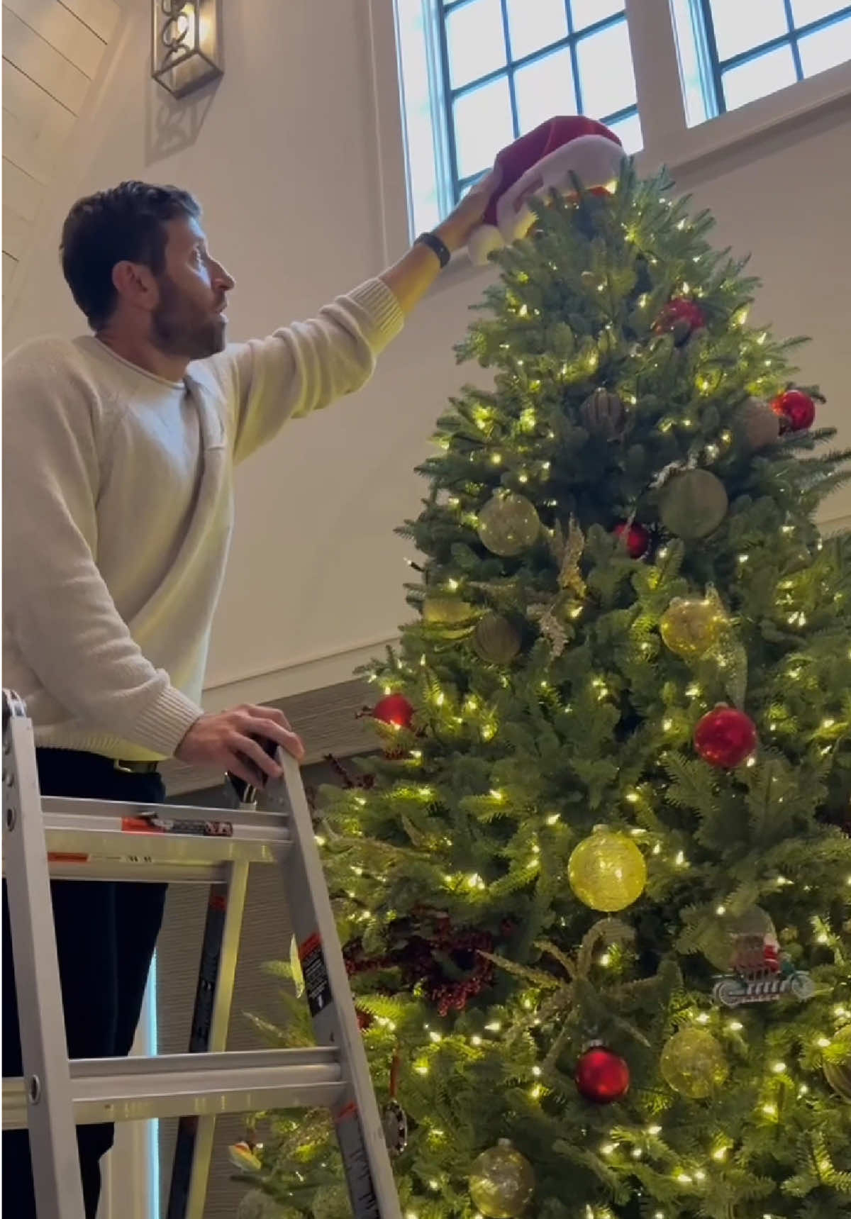 Sure you've heard of ornamants on the tree, but have you ever tried putting santa's hat on it? #HolidayMusic #ChristmasMusic #merrychistmas #newholidaymusic #hoilday #Family 